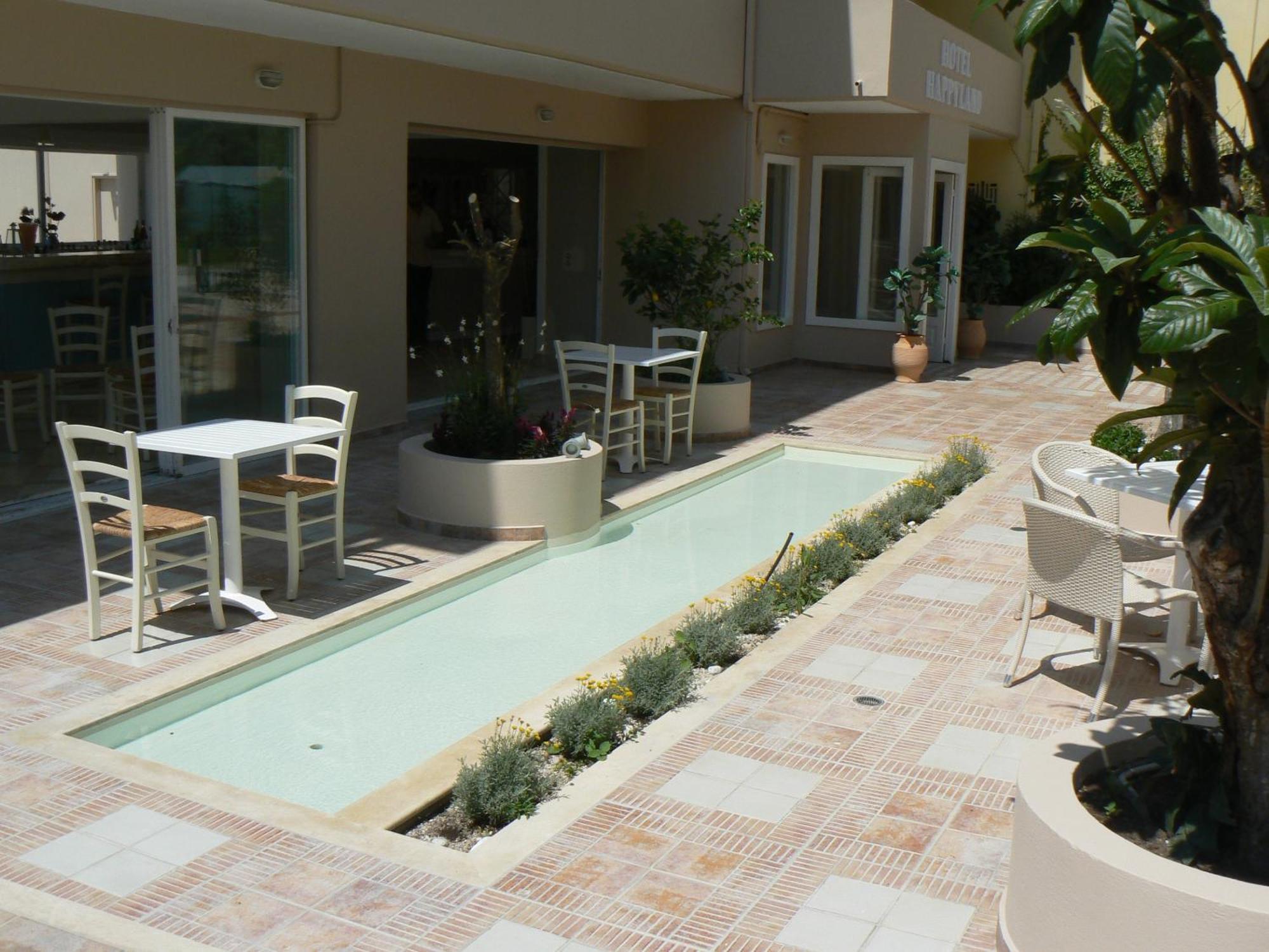 Happyland Hotel Apartments Νυδρί Εξωτερικό φωτογραφία