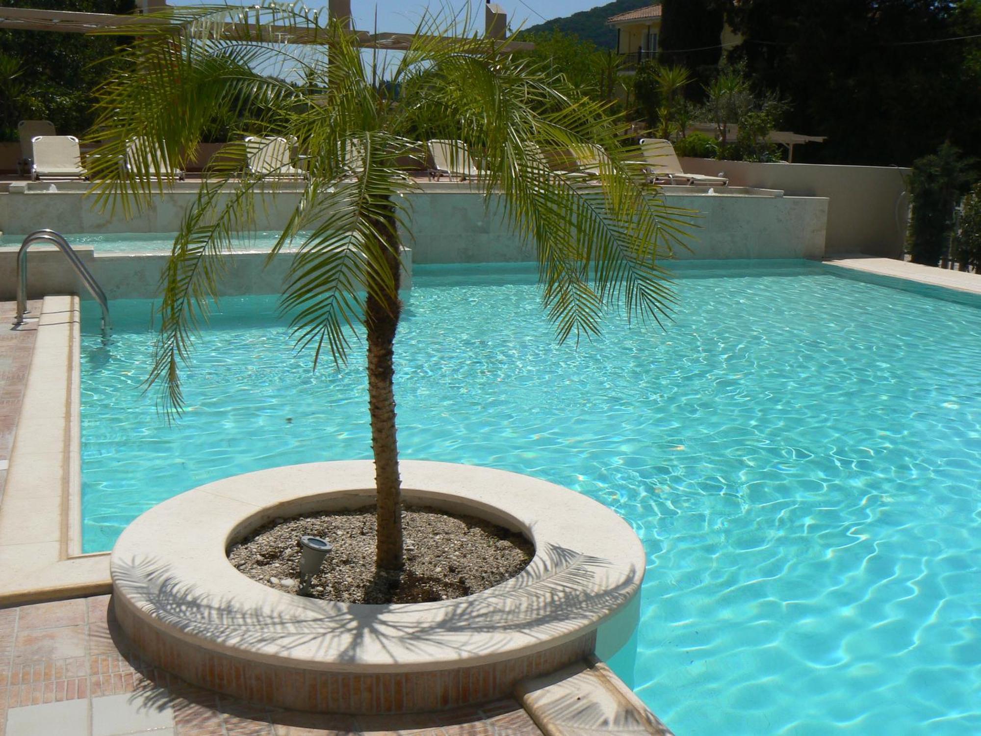 Happyland Hotel Apartments Νυδρί Εξωτερικό φωτογραφία