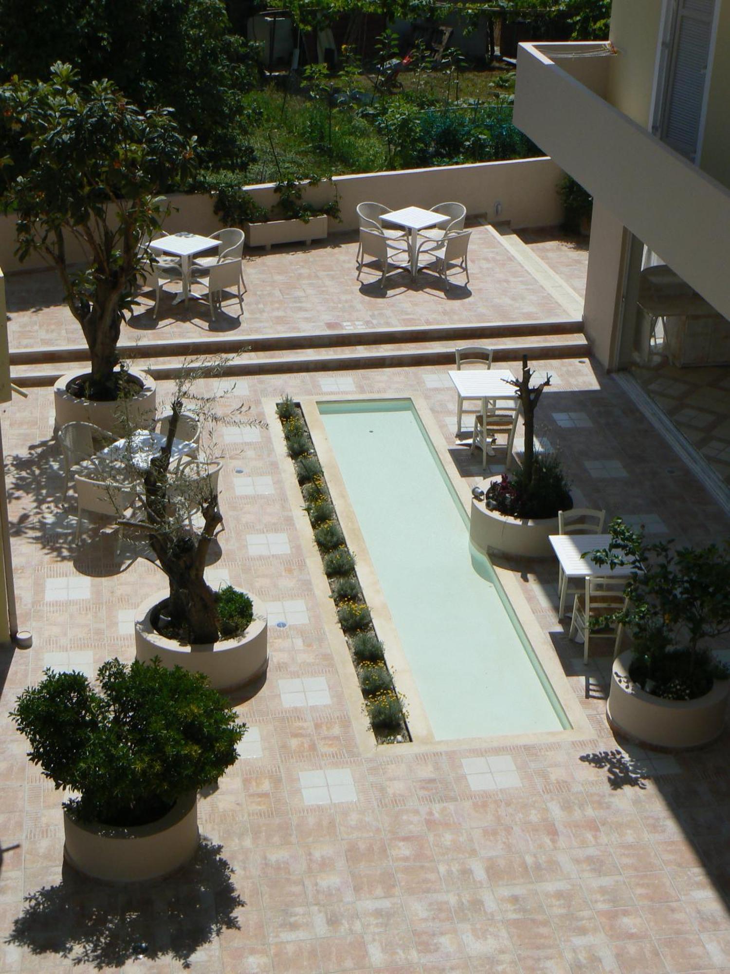 Happyland Hotel Apartments Νυδρί Εξωτερικό φωτογραφία