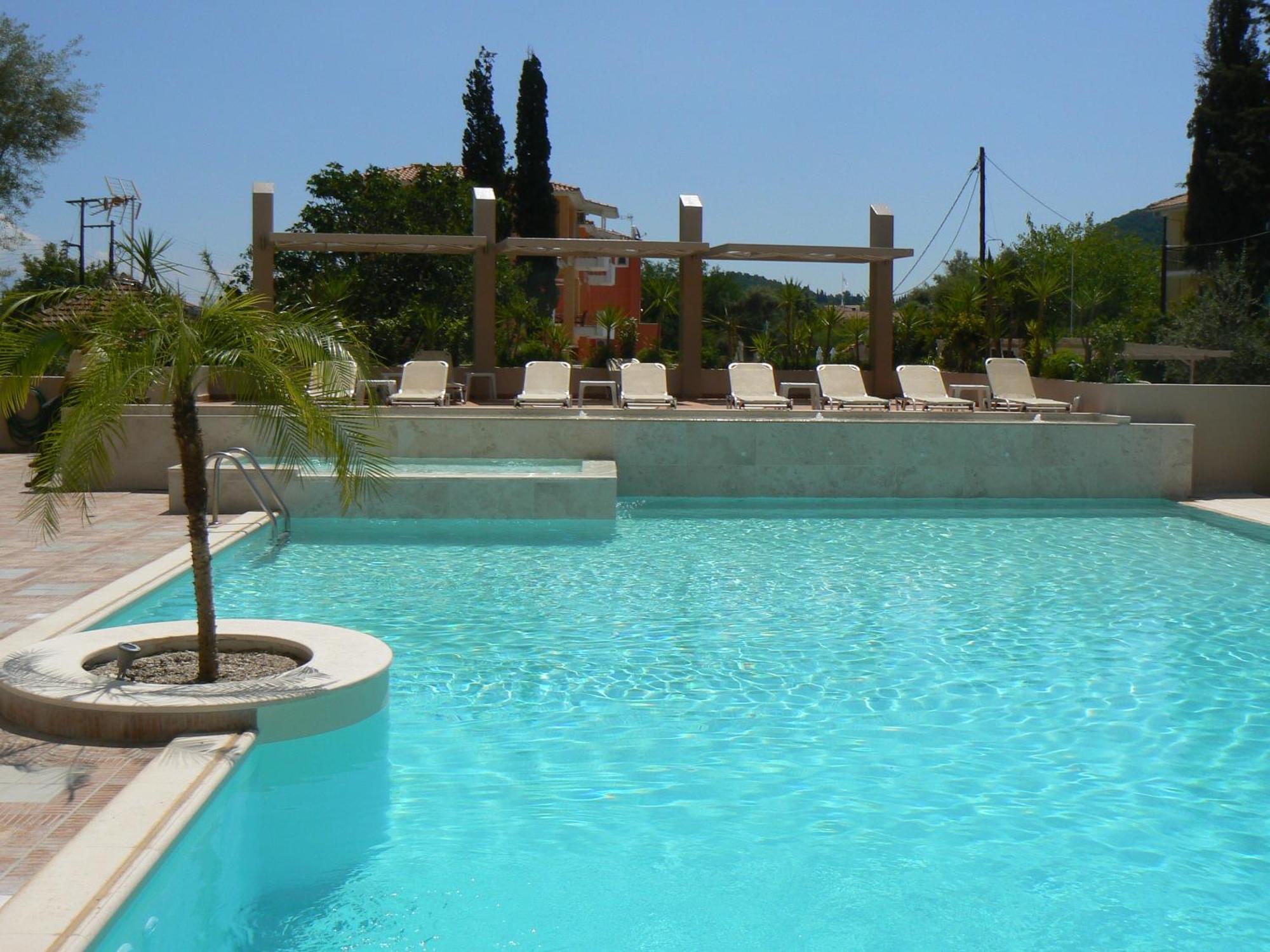Happyland Hotel Apartments Νυδρί Εξωτερικό φωτογραφία