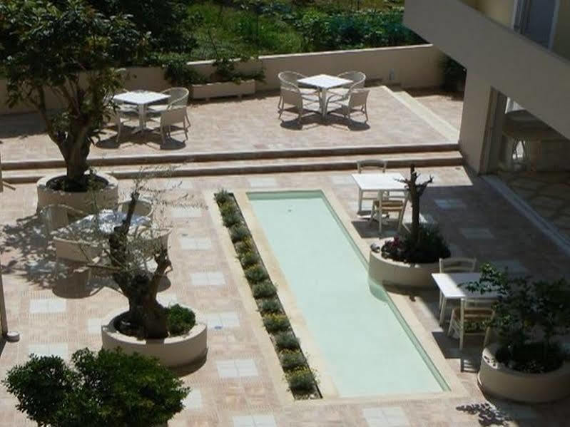 Happyland Hotel Apartments Νυδρί Εξωτερικό φωτογραφία